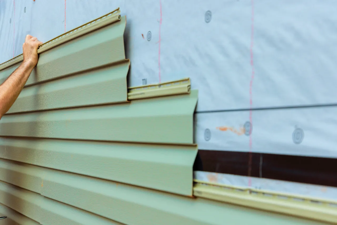 Vinyl siding installation on a Connecticut home
